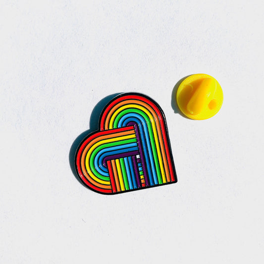 Pride enamel pin featuring a rainbow heart on a soft enamel finish.
LGBTQ+ rainbow pin with vibrant colors and a retro-inspired design.
Close-up of a high-quality LGBTQ enamel pin on a denim jacket.
LGBTQ Pride badge with a heart-shaped rainbow design, perfect for bags or accessories.
Soft enamel pride pin with a secure backing, ideal for showing LGBTQ+ support.